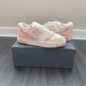 Pink and white New Balance 550